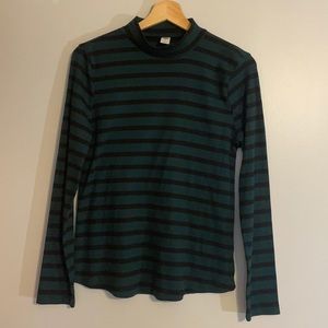 Striped turtle neck shirt.